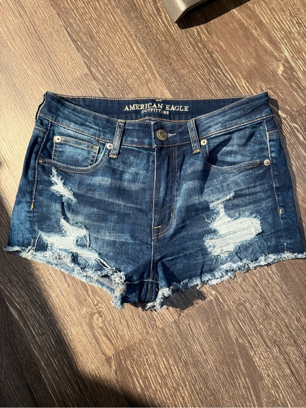 AE High Rise Distressed Stretch Denim Shorts